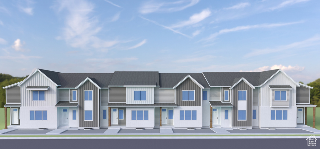 Townhome / multi-family property featuring board and batten siding
