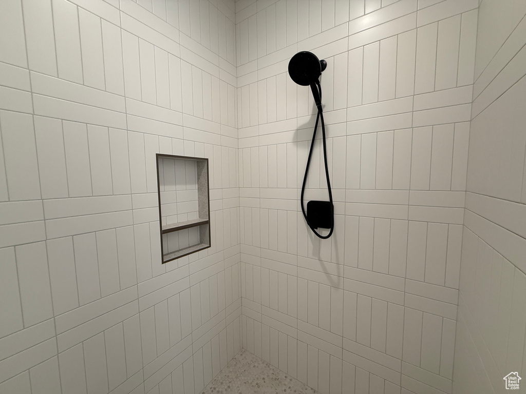 Bathroom view of a tile shower