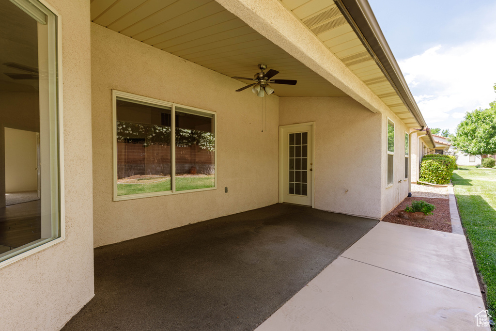 View of patio featuring a ceiling fan