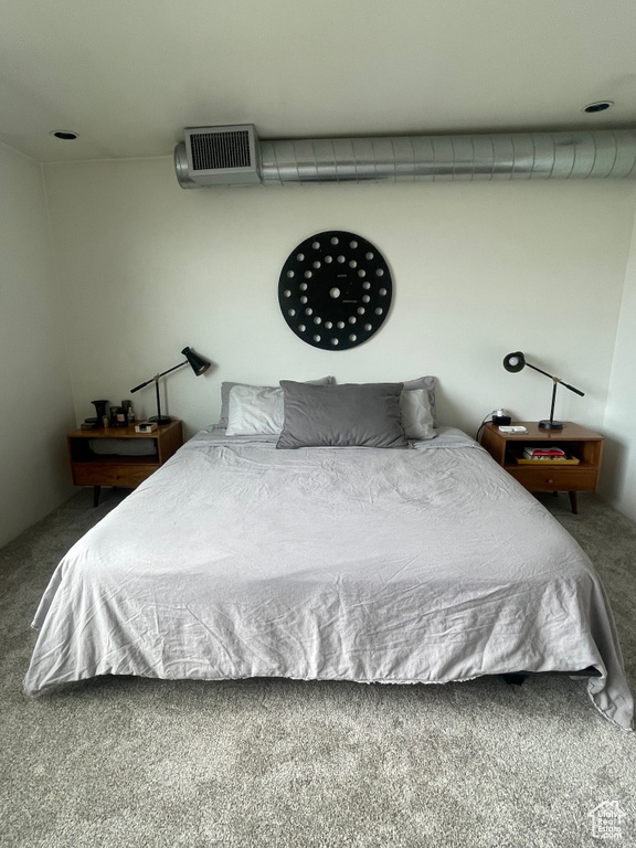 Bedroom featuring carpet