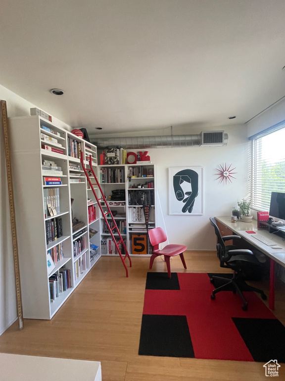 Office area featuring wood finished floors