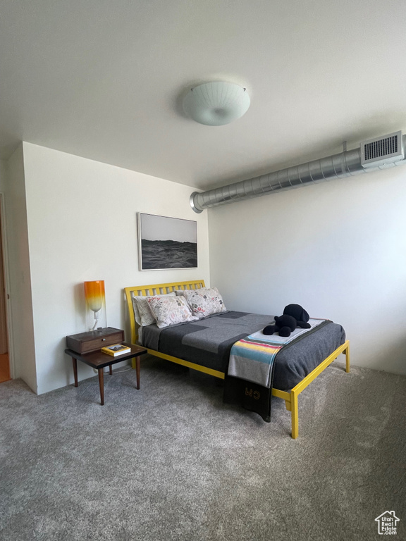 Bedroom with carpet flooring