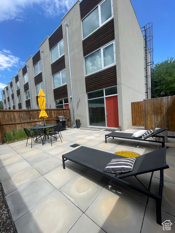 View of patio with outdoor dining space