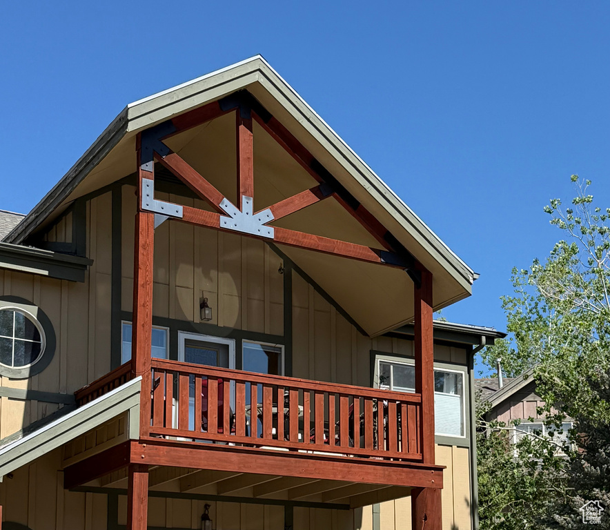 Rear view of house featuring board and batten siding