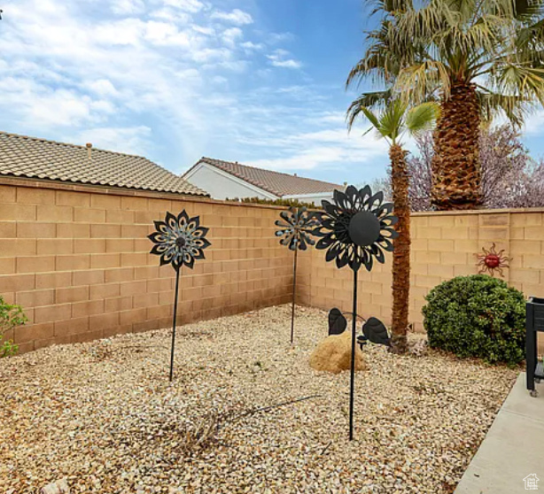 View of fenced backyard
