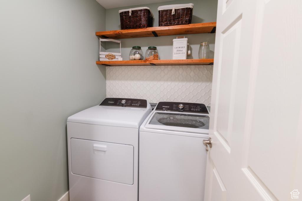 Laundry area featuring washer and clothes dryer