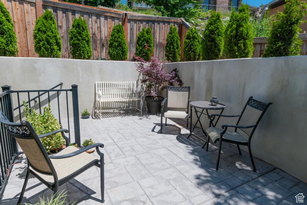 Fenced backyard featuring a patio area