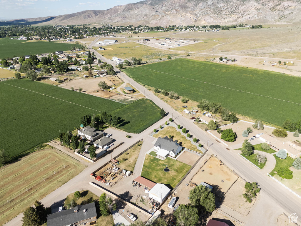 Aerial overview of property's location with mountains and rural landscape