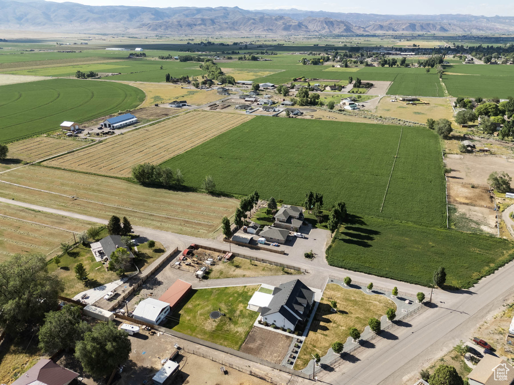 Aerial overview of property's location featuring rural landscape and rows of crops