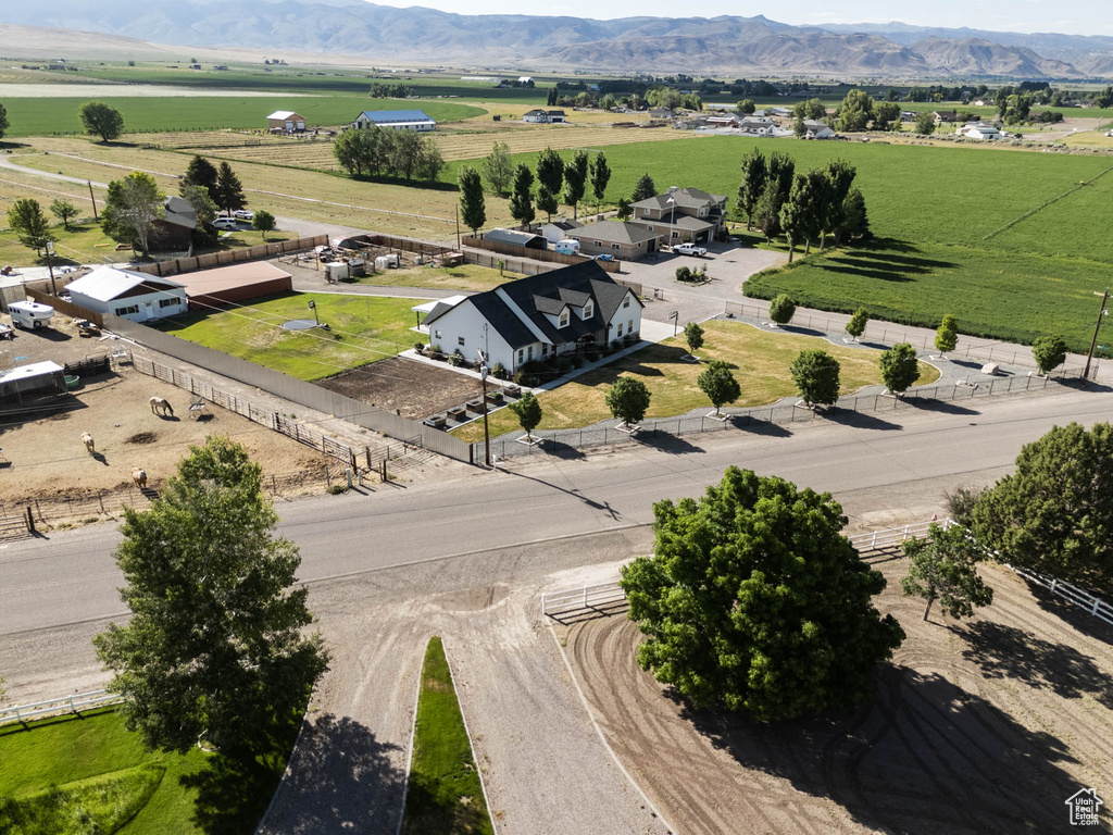Overview of rural landscape with a mountain backdrop