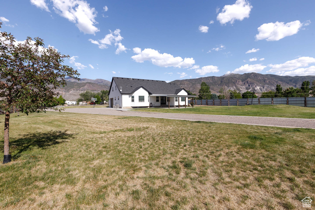 View of front of house featuring a mountain view