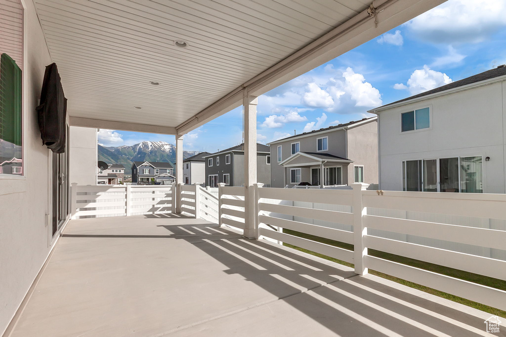 View of patio featuring a residential view and a mountain view