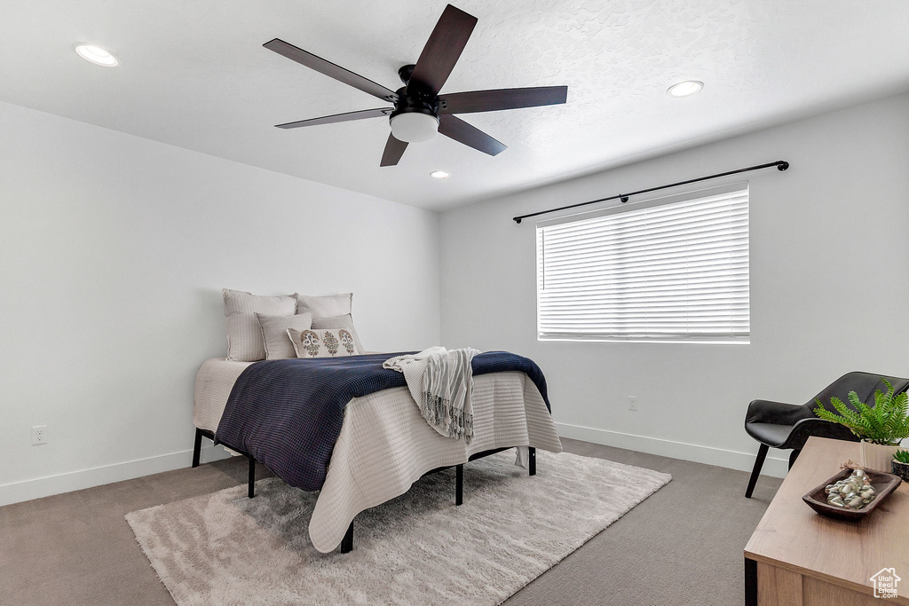 Bedroom with carpet, baseboards, recessed lighting, and a ceiling fan