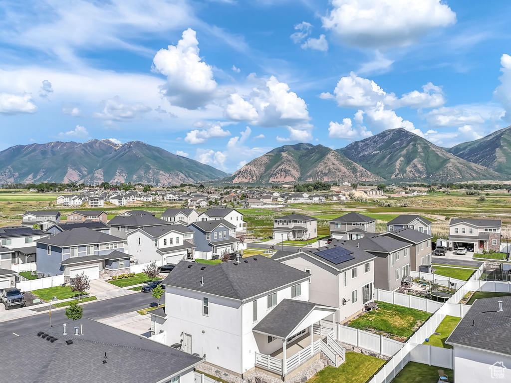 View of mountain background featuring nearby suburban area