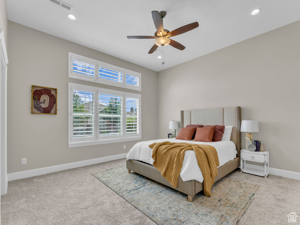 Bedroom with carpet floors, baseboards, recessed lighting, and a ceiling fan
