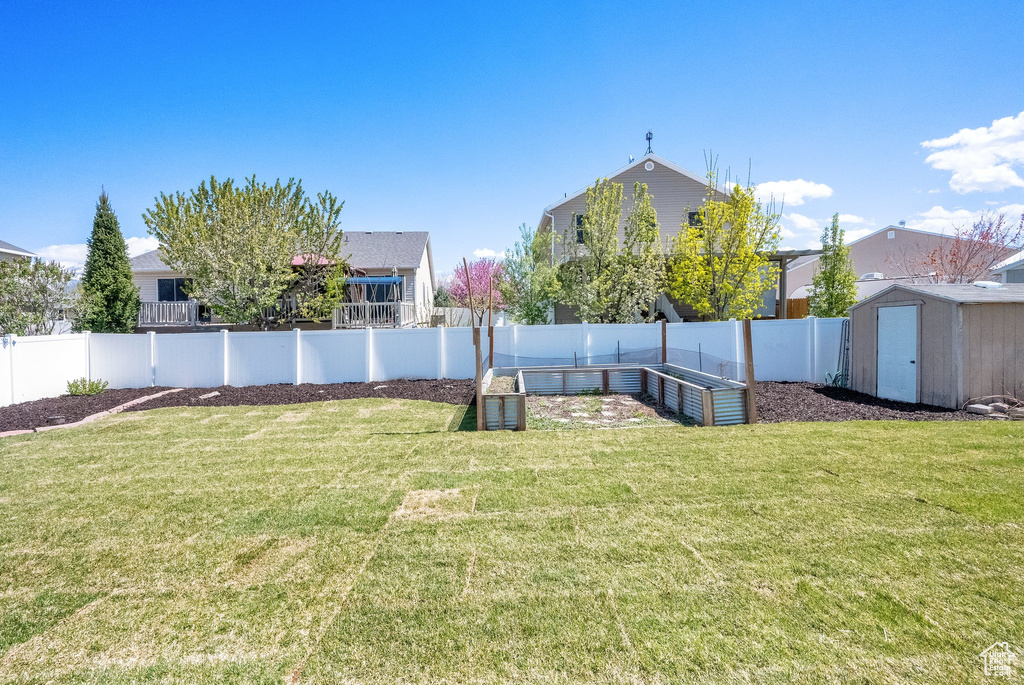 View of yard featuring a garden