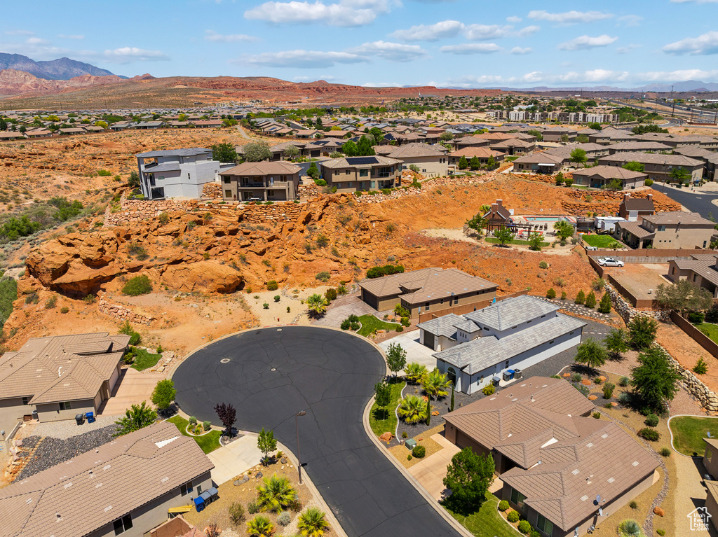 Aerial view of residential area with a mountainous background