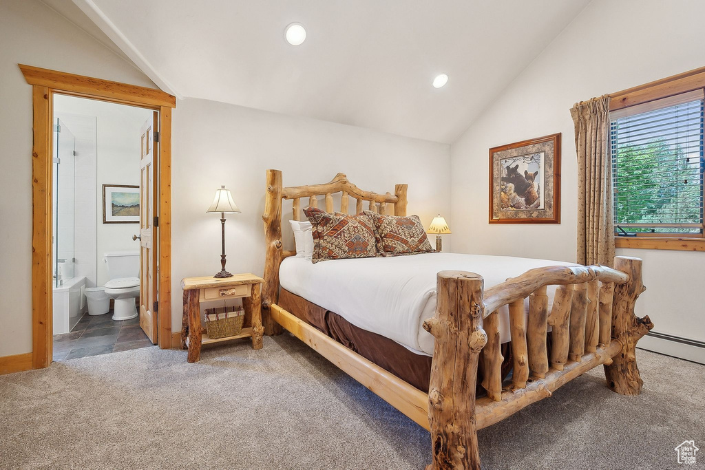 Carpeted bedroom with lofted ceiling, recessed lighting, connected bathroom, a baseboard radiator, and baseboards