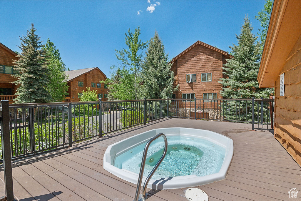 View of pool featuring a deck