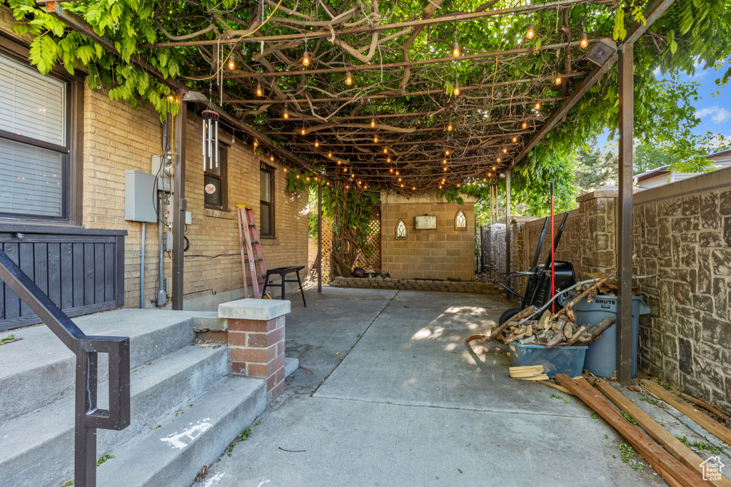 Fenced backyard with a patio area