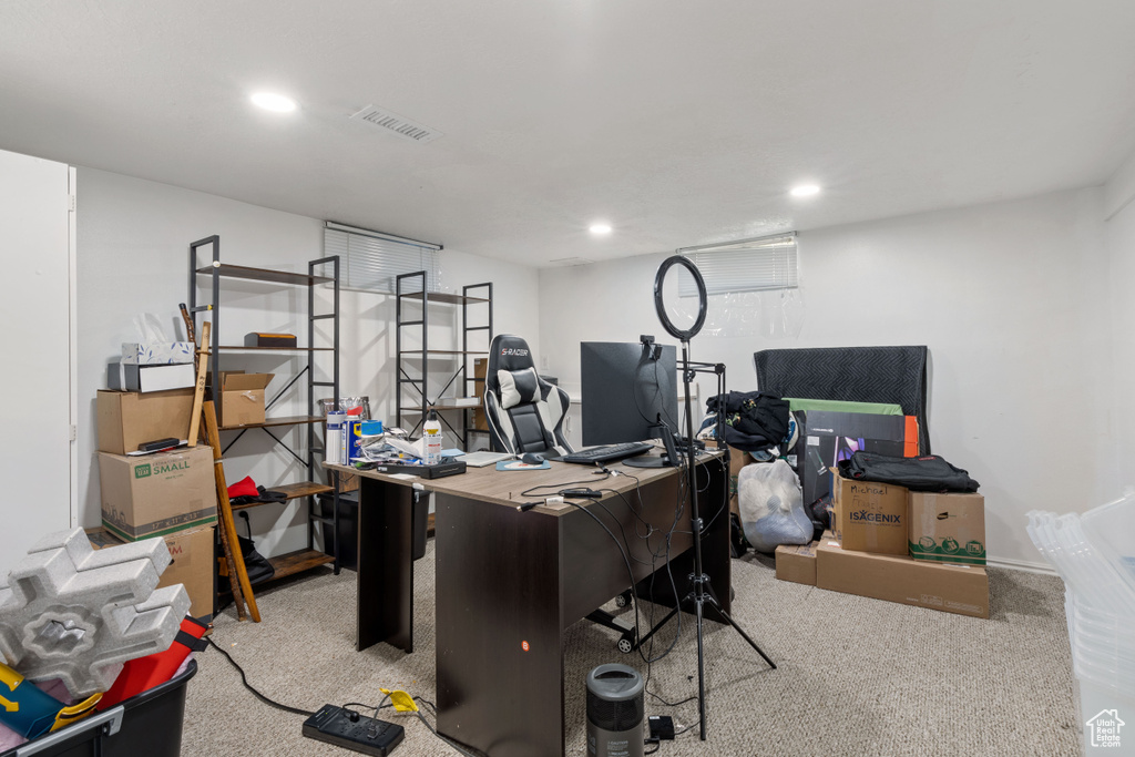 Carpeted home office featuring recessed lighting