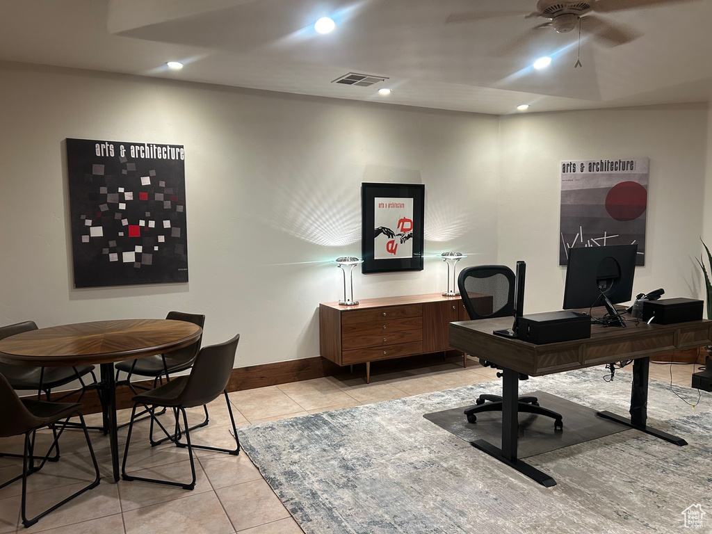 Office space featuring a ceiling fan, light tile patterned floors, baseboards, and recessed lighting