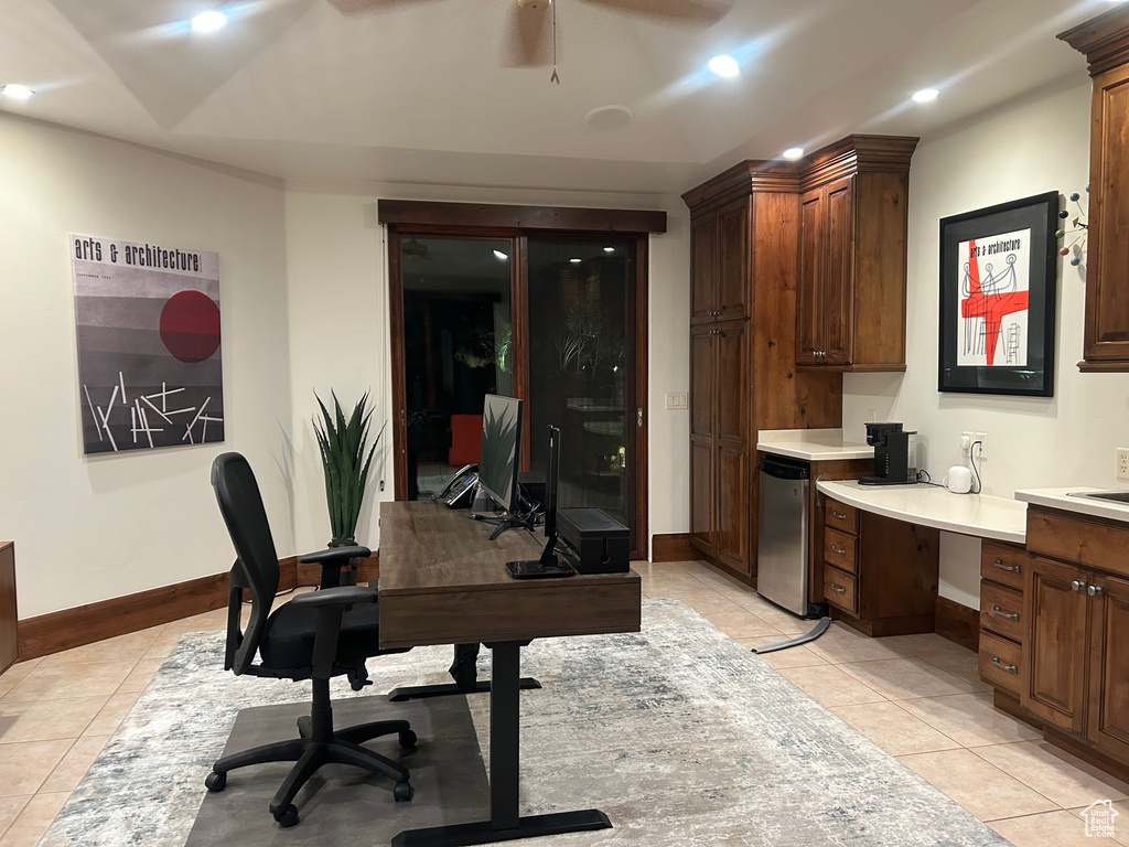 Office area featuring light tile patterned floors, recessed lighting, baseboards, and a ceiling fan
