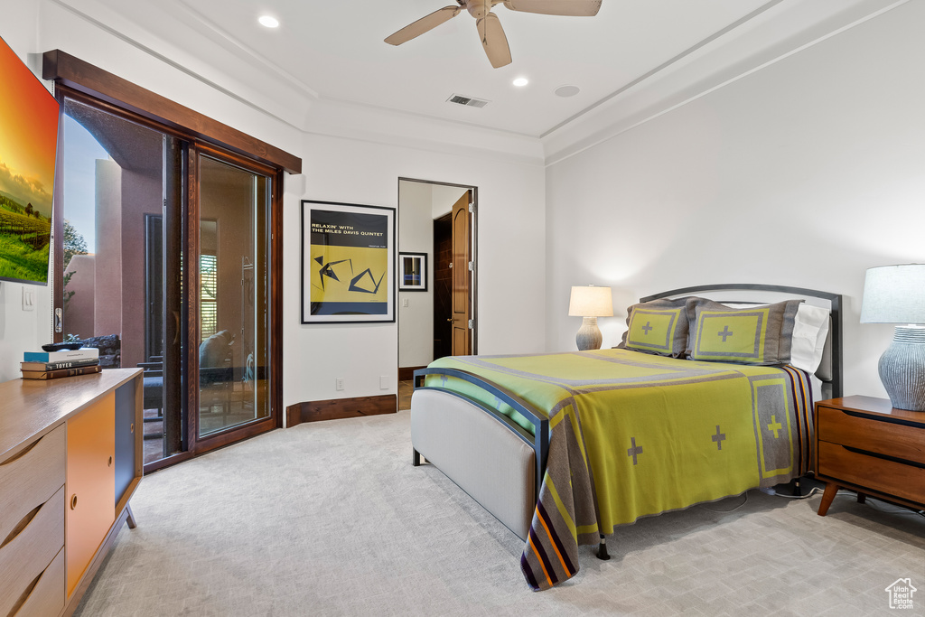 Bedroom featuring light colored carpet, baseboards, recessed lighting, crown molding, and ceiling fan