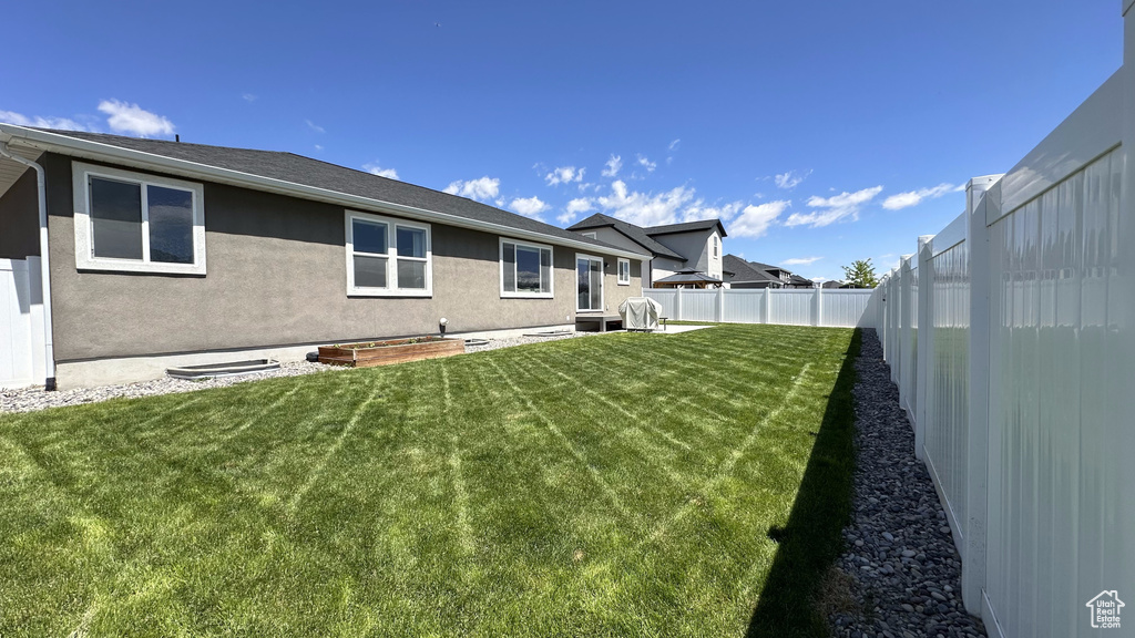 Back of property with stucco siding