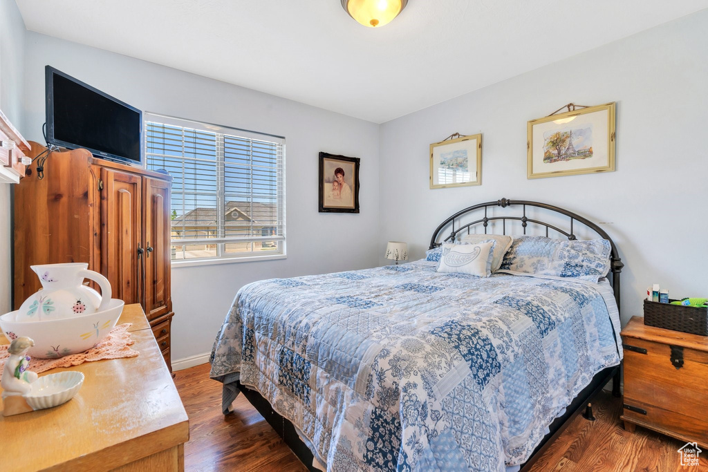 Bedroom featuring wood finished floors