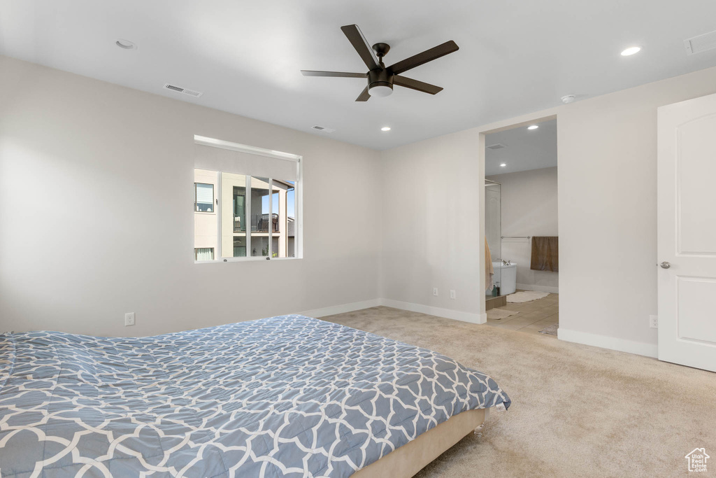 Carpeted bedroom with recessed lighting, baseboards, and ceiling fan