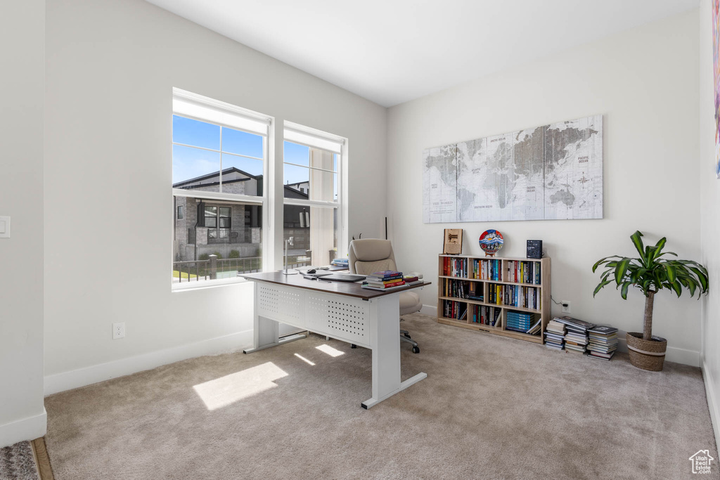 Office featuring carpet and baseboards