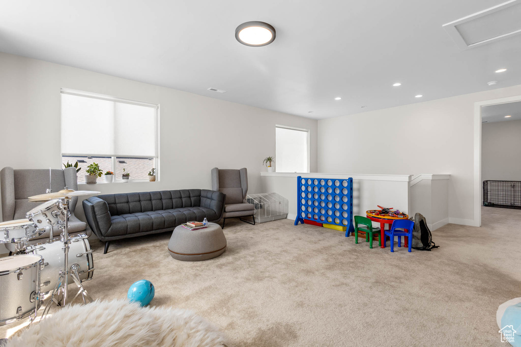 Game room with carpet flooring and recessed lighting