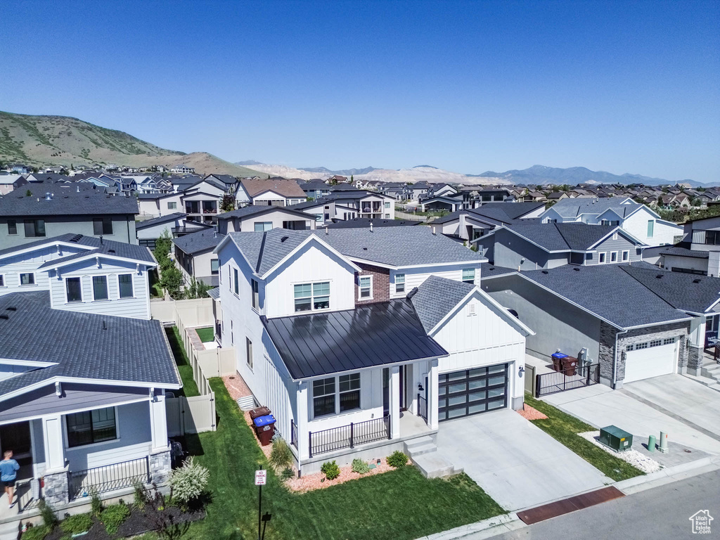 Aerial view of residential area with mountains