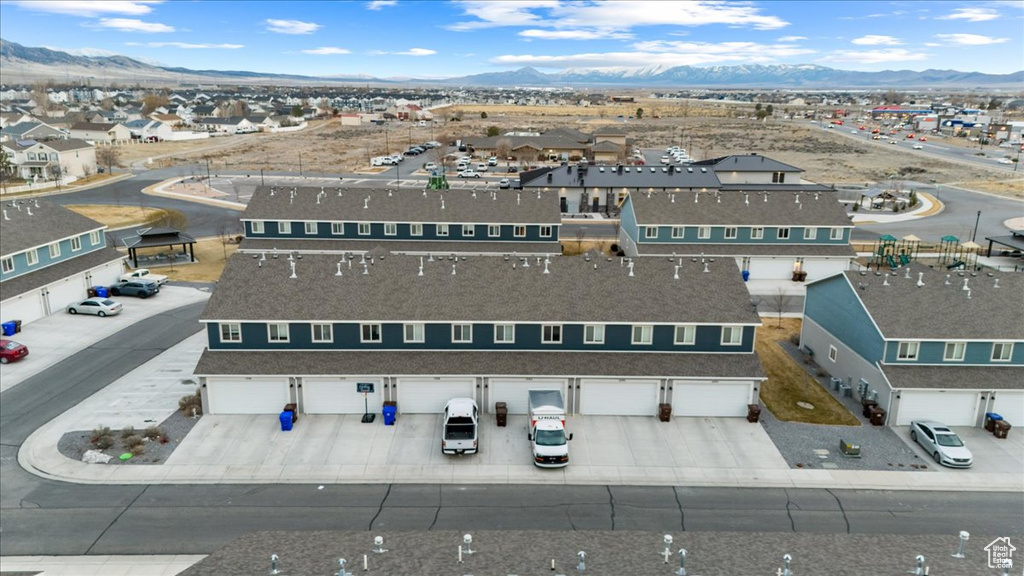 Aerial view of residential area with a mountain backdrop