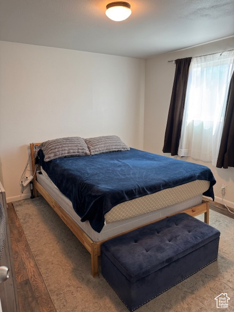 Bedroom with baseboards