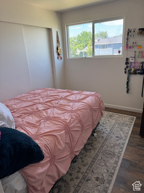 Bedroom with wood finished floors