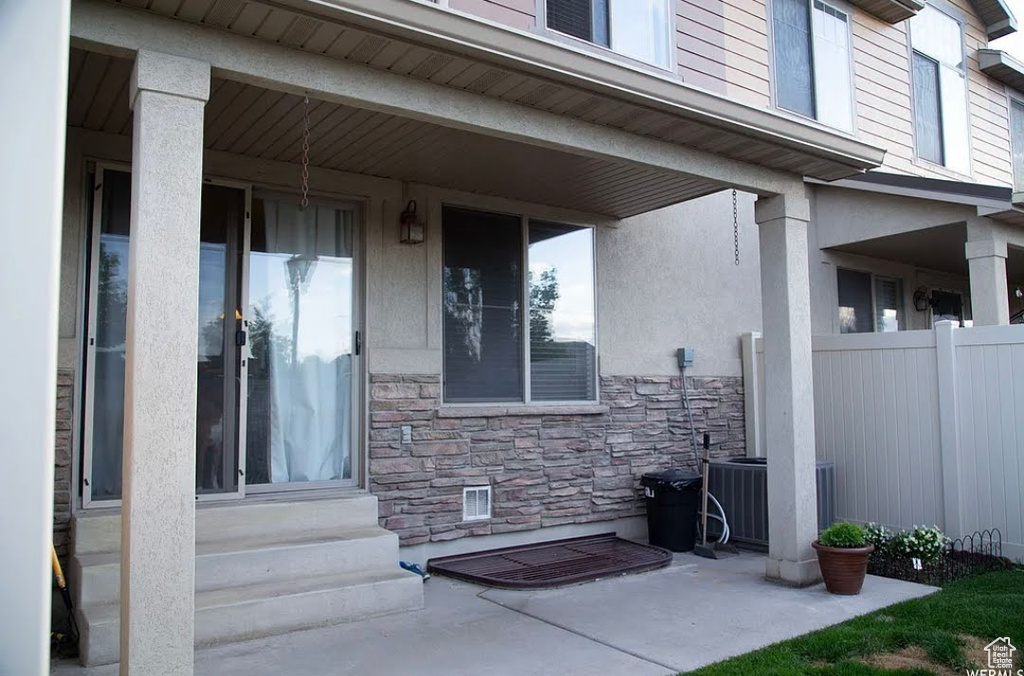View of patio / terrace with entry steps and central AC