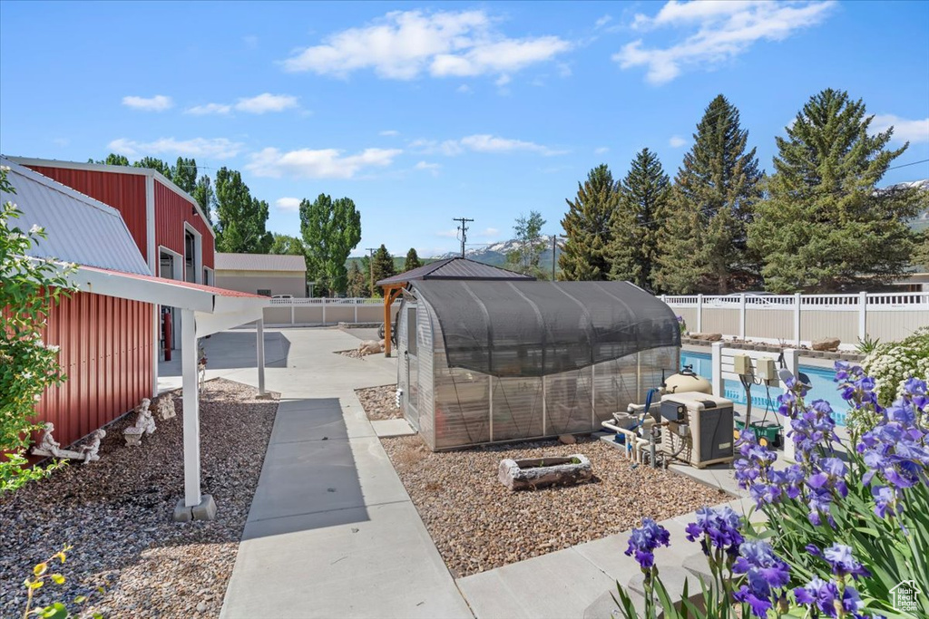Fenced backyard with a patio area