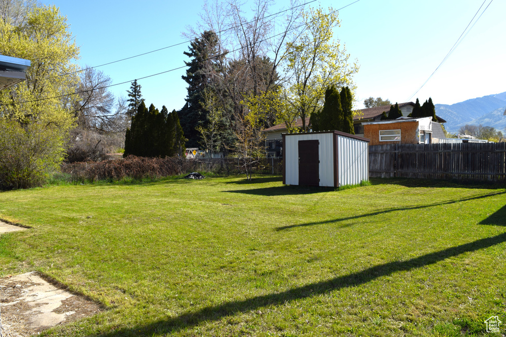 View of yard with a mountain view