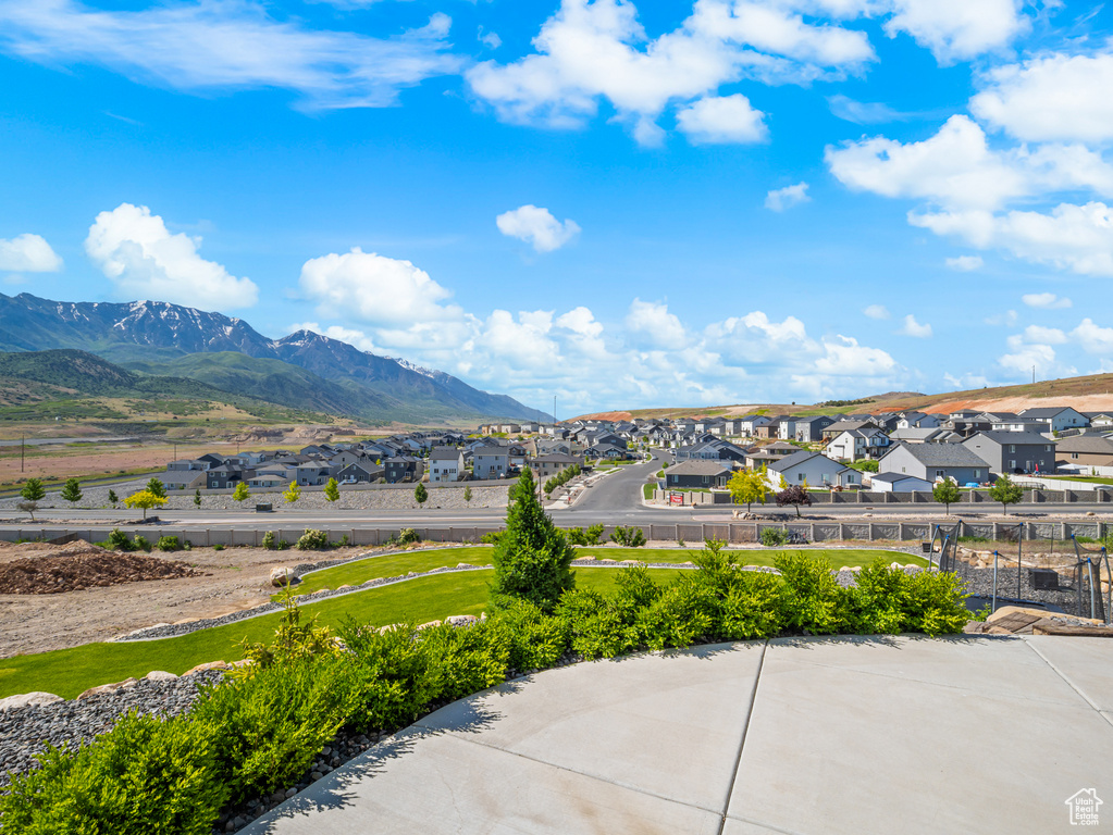 View of mountain background featuring nearby suburban area