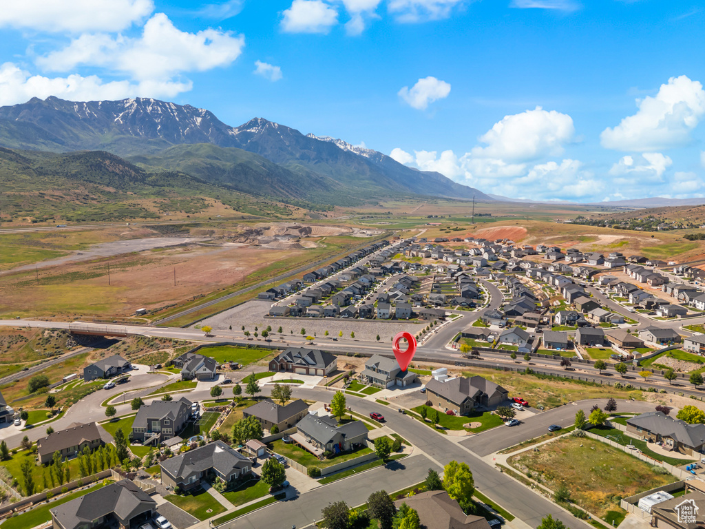 Aerial view of property\\\\\\\\\\\\\\\'s location featuring nearby suburban area and a mountainous background