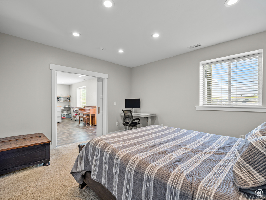 Bedroom featuring recessed lighting and carpet flooring