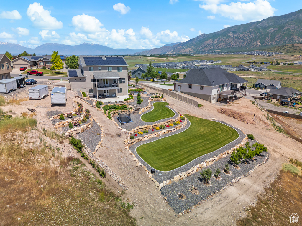 Aerial view of residential area with a mountain backdrop
