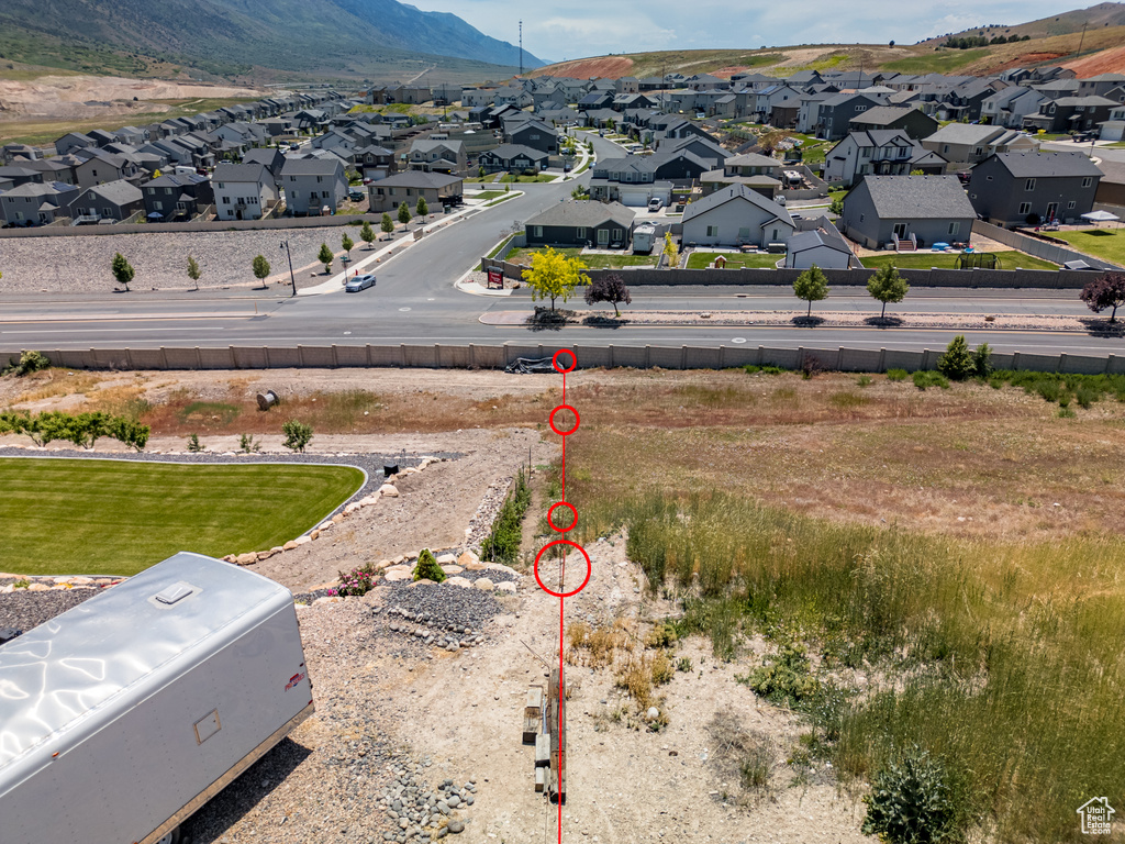 Aerial perspective of suburban area with mountains