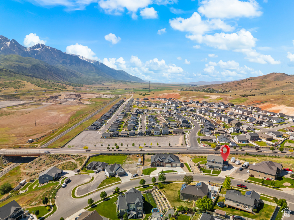 View of property location with nearby suburban area and mountains
