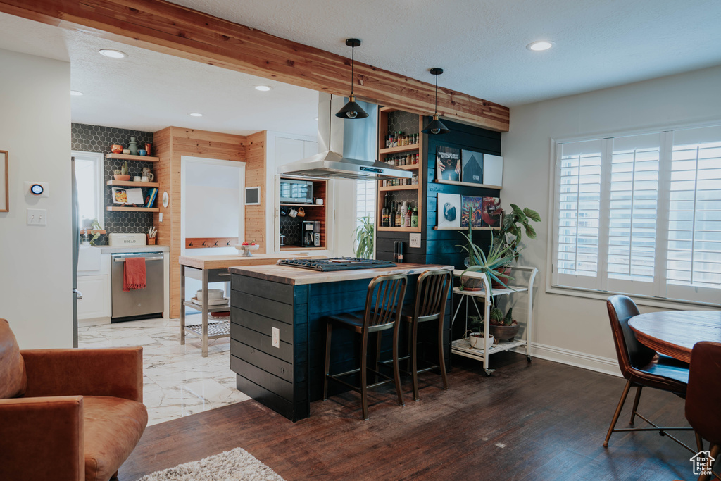 Kitchen featuring open shelves, island exhaust hood, dishwasher, recessed lighting, and gas stovetop