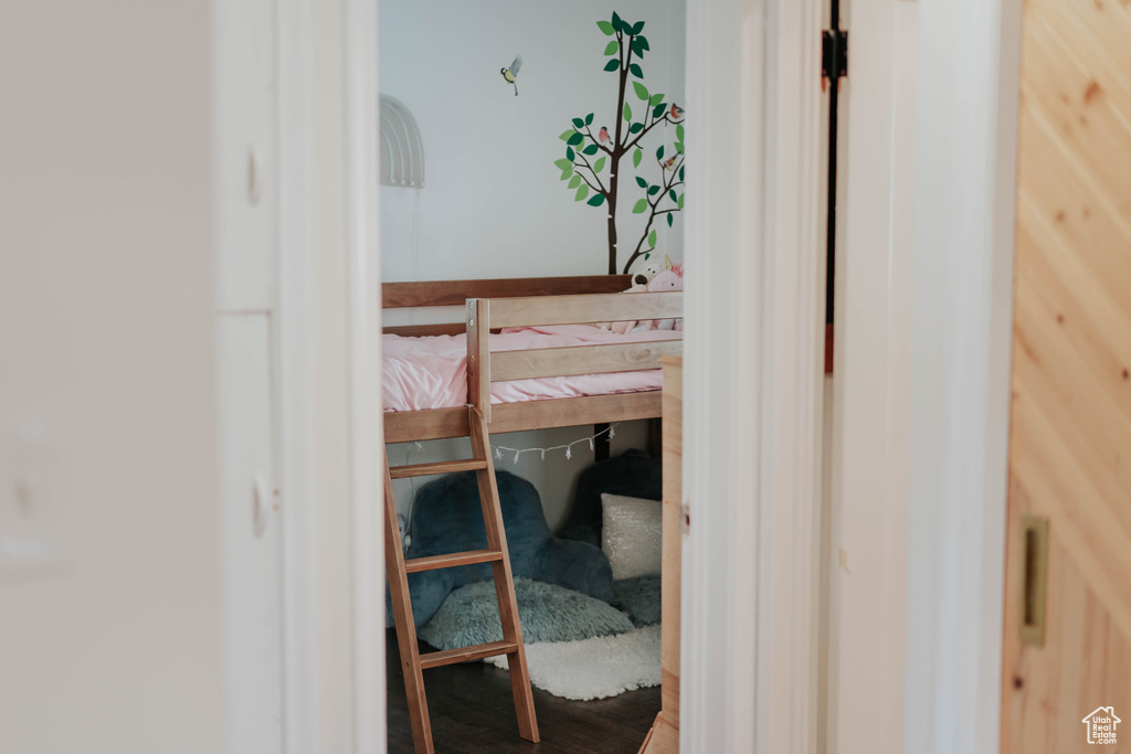 Bedroom with wood finished floors