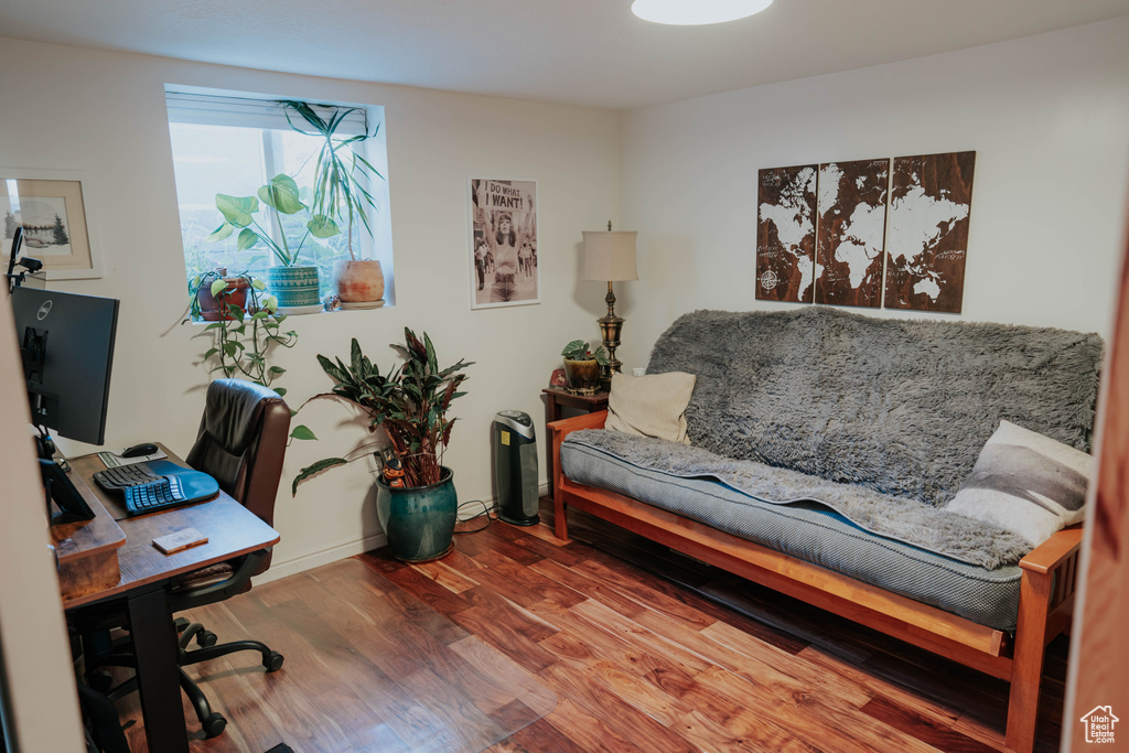 Home office featuring wood finished floors