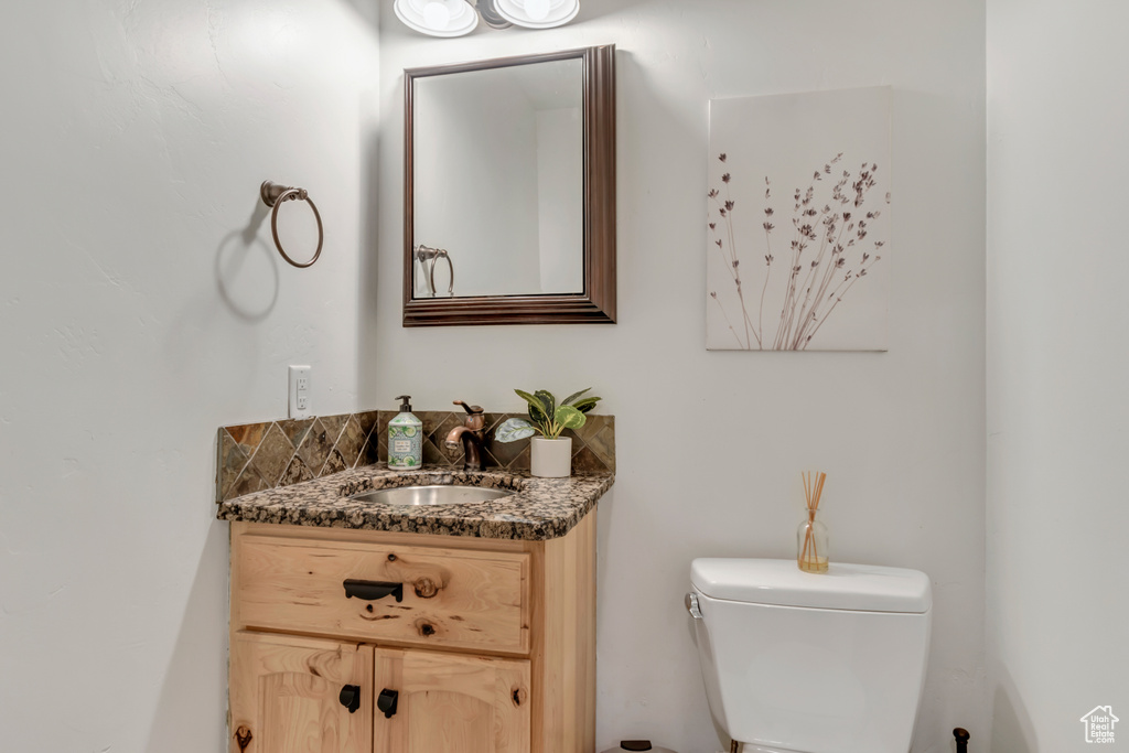 Half bath with toilet and vanity